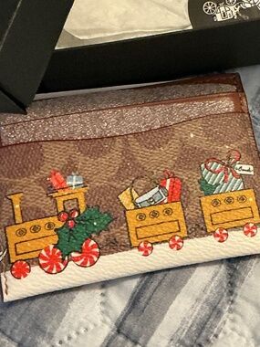 NWT Coach ChristmasHoliday signature card holder with box and tags